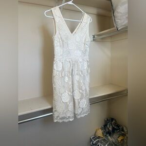 Elegant Cream Lace Dress with gold and button accents